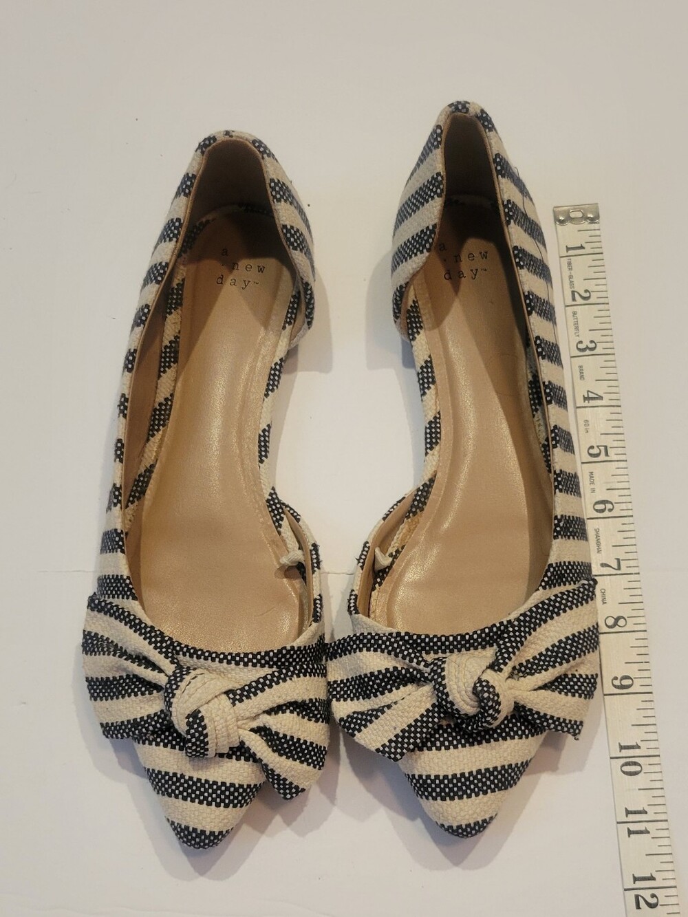 A New Day size 9.5 navy and white canvas shoes with pointed toe and bows